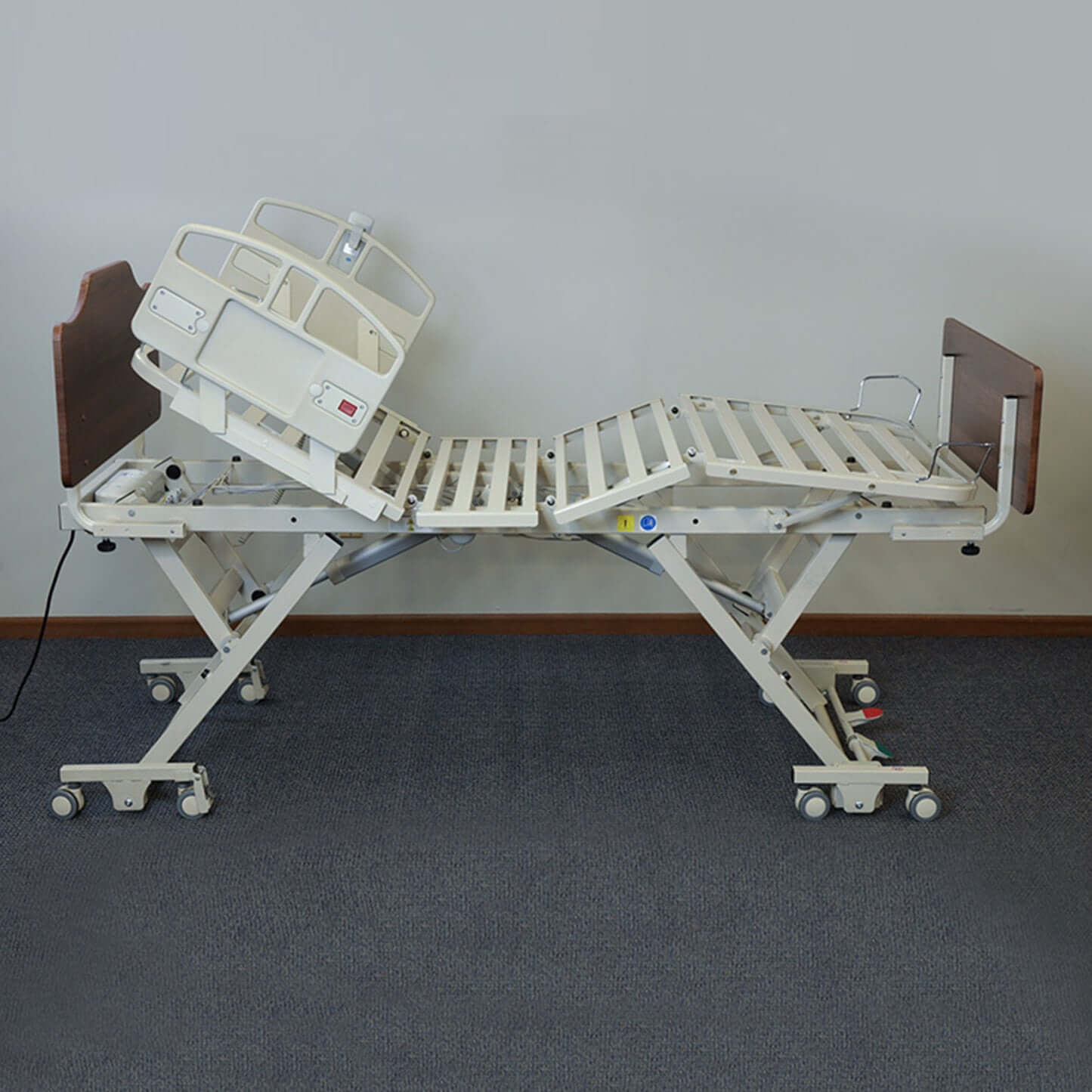 NOA Elite II Long Term Care Bed adjustable hospital bed in hi-low position for homecare use.