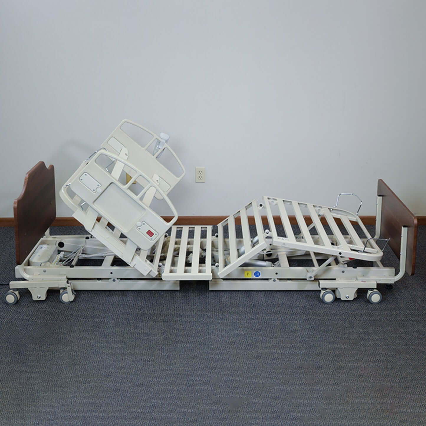 NOA Elite II Long Term Care Bed in adjustable position, showcasing hospital bed features for homecare use.