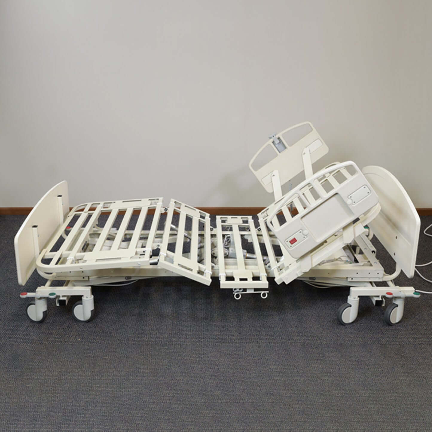 NOA Expandable Bariatric Hospital Bed in adjustable position, showcasing hi-low features for homecare uses.